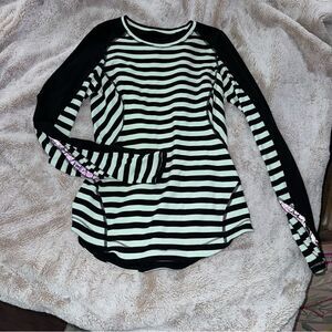Lululemon size 8 Longsleeve Active Shirt excellent condition.
